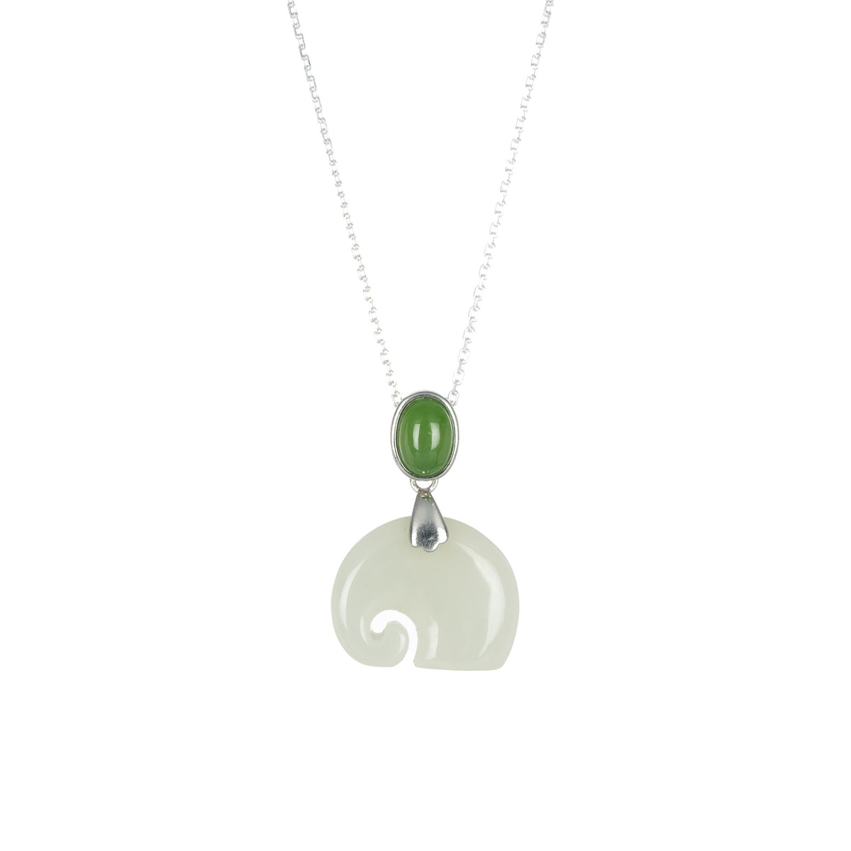 A necklace with a whimsical elephant-shaped pendant carved from pale green nephrite jade, with a green nephrite jade oval at the top, attached to a silver or gold vermeil setting on a silver chain.