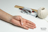 woman's hand preparing for jade bangle bracelet sizing. mays jade bangle sizing guide.
