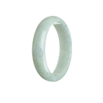A close-up image of a very pale green jadeite bangle with an oval shape, measuring 56mm in diameter. The bangle is certified as natural and is sold by MAYS.