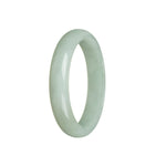 A beautiful light green jadeite bracelet with a half moon design, measuring 56mm in size. Perfect for adding a touch of elegance to any outfit.