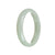 A close-up image of a white Burmese jade bracelet in the shape of a half moon, measuring 56mm in diameter. The bracelet appears to be made of high-quality, genuine grade A jade.