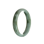 A half-moon shaped jade bracelet with an untreated green color and intricate pattern, sold by MAYS.