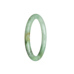A small round light green jade bangle, untreated and made of genuine jadeite.