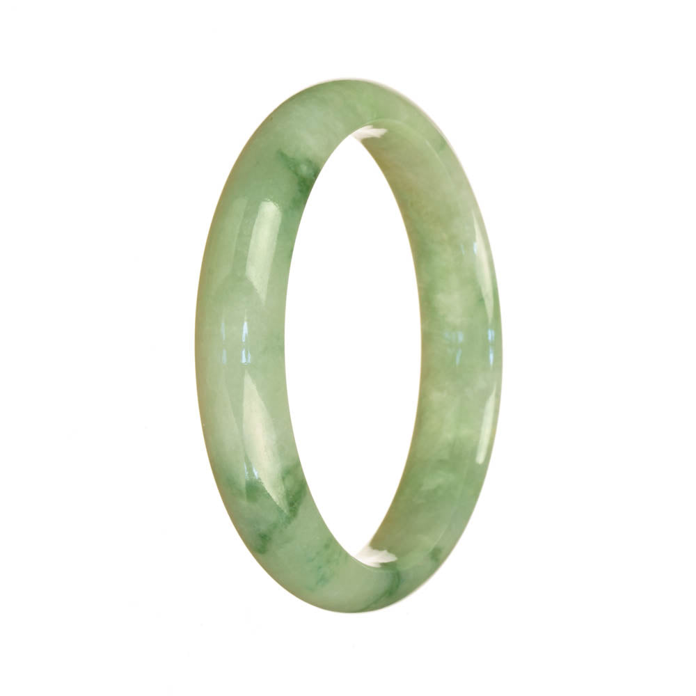A light green jadeite jade bangle with a unique half moon pattern, untreated and genuine.