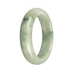 A beautiful jade bangle bracelet featuring a mix of green and lavender tones with apple green spots, crafted from genuine Grade A jade. The bracelet has a 57mm diameter and a unique half moon shape. A stunning piece from MAYS GEMS.