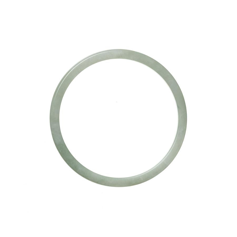 A delicate and elegant pale green Burma Jade bracelet, with a thin 50mm width. Perfect for adding a touch of natural beauty to any outfit.