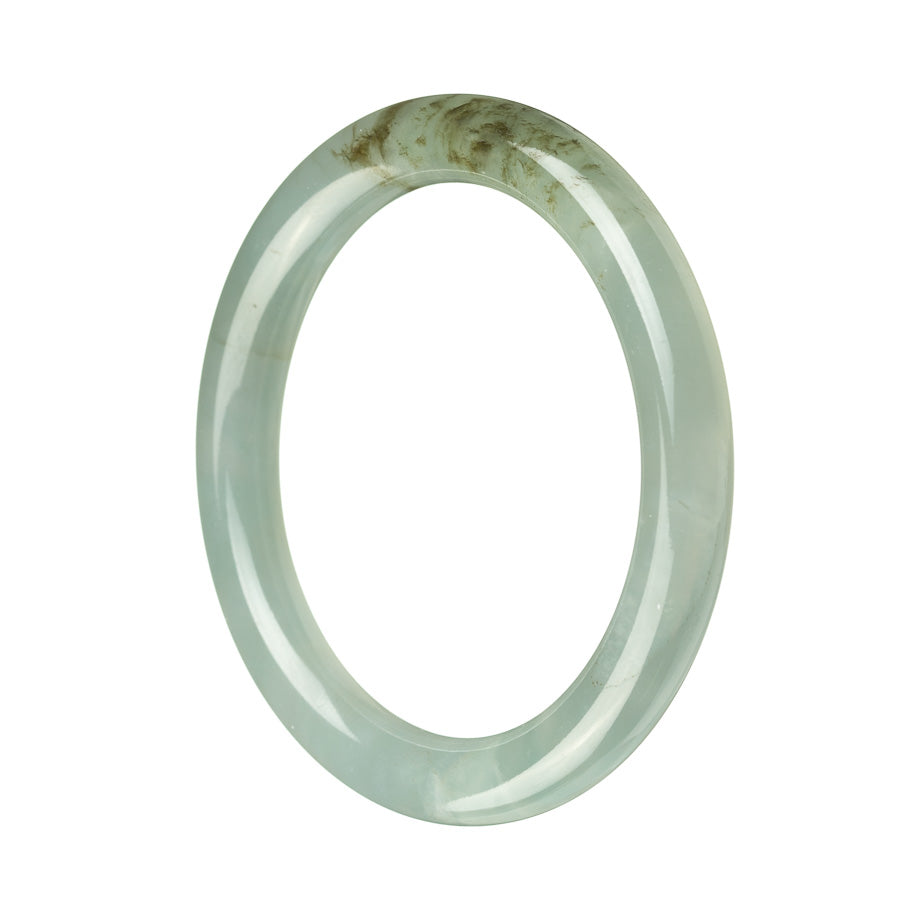A beautiful jade bangle bracelet with a greyish green hue, originating from Burma. The bracelet is untreated and showcases a semi-round shape, measuring 58mm in diameter. A stunning accessory from the MAYS collection.