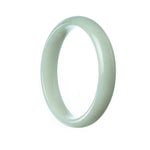 A half moon-shaped pale green jade bangle, showcasing the natural beauty and elegance of this rare gemstone.
