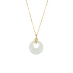 A gold-plated sterling silver pendant in the shape of a donut, with a natural Hetian jade centerpiece, attached to a matching gold-plated silver chain.