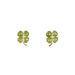 A pair of gold vermeil stud earrings featuring green jade heart-shaped petals with a clear zircon center.