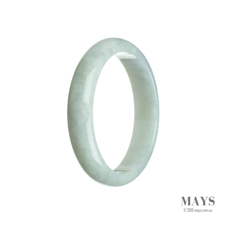 A beautiful pale green and lavender jade bracelet in the shape of a half moon, measuring 56mm.