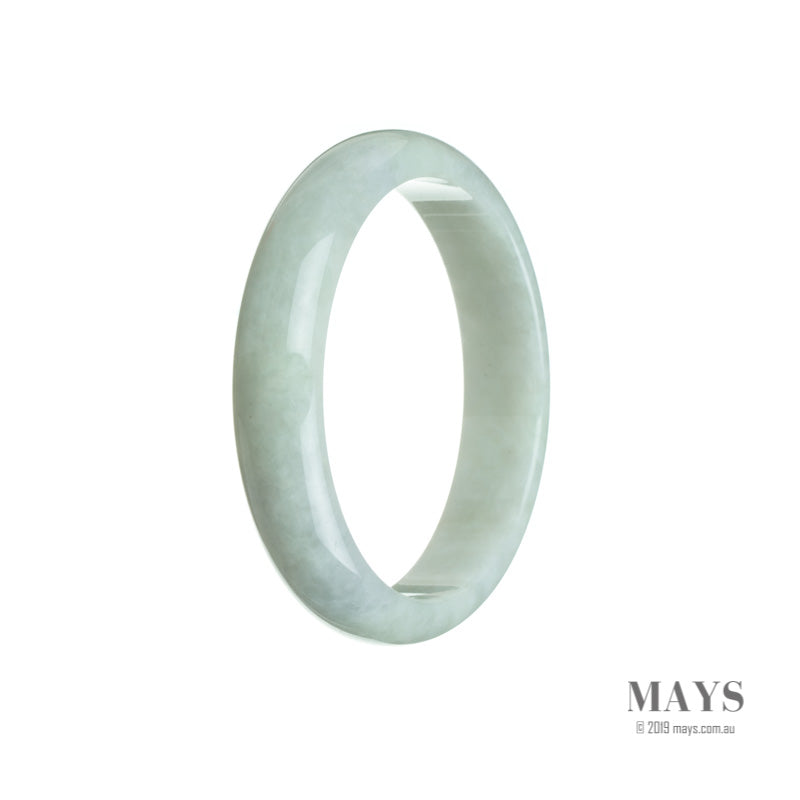 A beautiful half moon-shaped Burmese Jade bangle with a genuine Grade A pale green color and subtle hints of lavender. Perfect for adding a touch of elegance to any outfit.