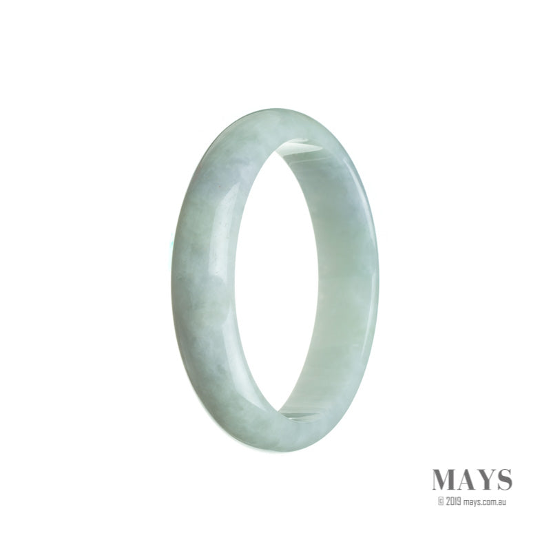 A beautiful pale green Burma Jade bracelet with an oval shape, measuring 55mm.
