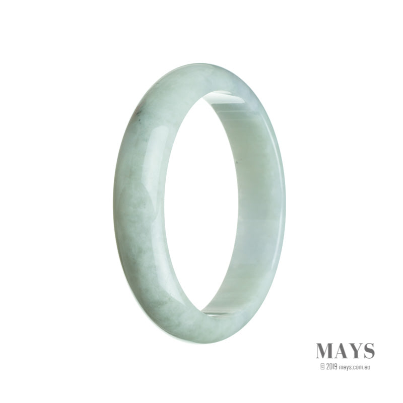 A pale green jadeite jade bangle with a half moon shape, measuring 60mm in size.