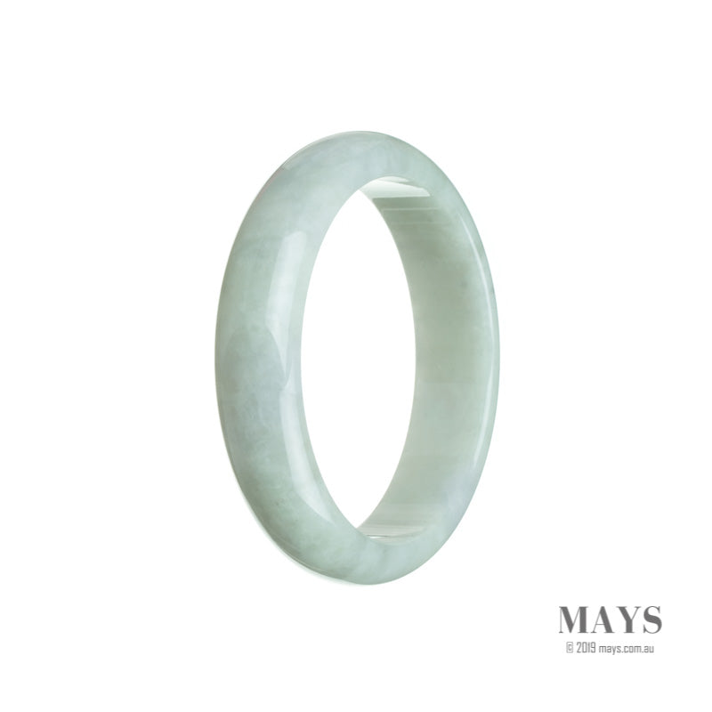 A half moon shaped pale green Burma jade bangle bracelet, untreated and authentic, measuring 54mm in size. A genuine piece of MAYS jewelry.