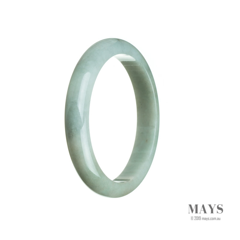 A pale green Burma Jade bangle with hints of lavender, featuring a semi-round shape.