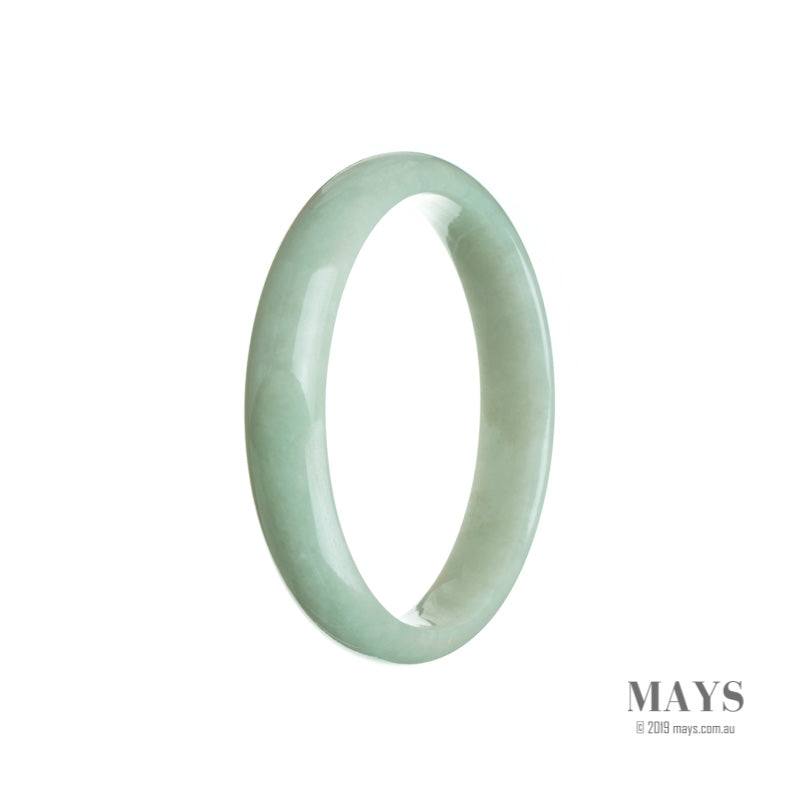 A light green jade bangle bracelet with a half moon design, made from genuine Grade A jade.