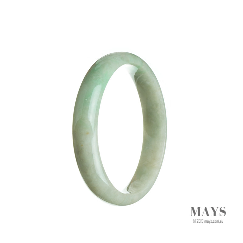 A light green jade bangle bracelet in a half moon shape, made from genuine Type A Burma jade.