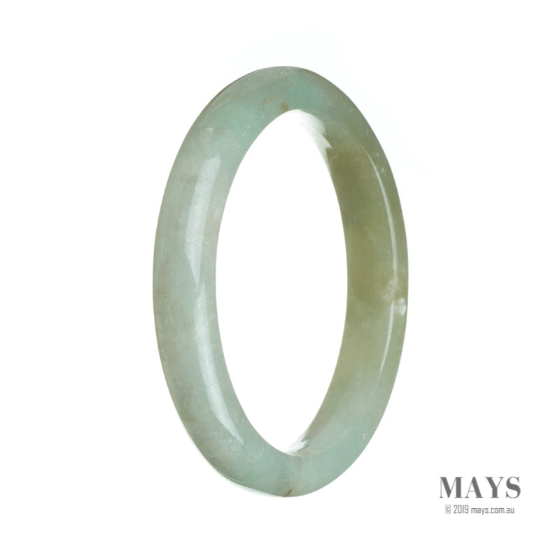 A close-up image of a pale green jadeite jade bangle with a semi-round shape, measuring 63mm in diameter. The bangle is made of genuine, natural jade and is being offered by MAYS GEMS.