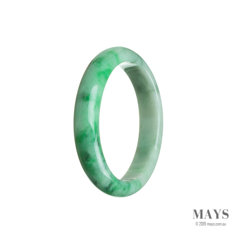 A beautiful, untreated green Burma jade bangle bracelet with an oval shape.