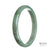 A close-up image of a certified Type A brownish green jade bracelet with a half-moon shape, measuring 77mm. This beautiful piece is sold by MAYS GEMS.