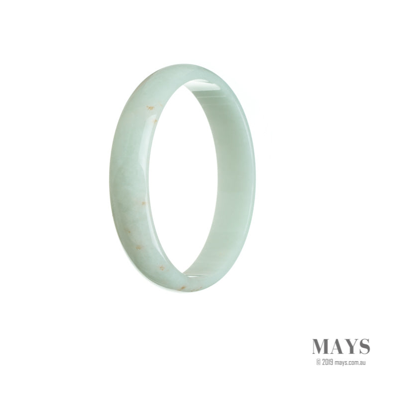 Close-up of a pale green Burma jade bangle, certified Grade A, with a flat shape and a diameter of 52mm. Sold by MAYS.