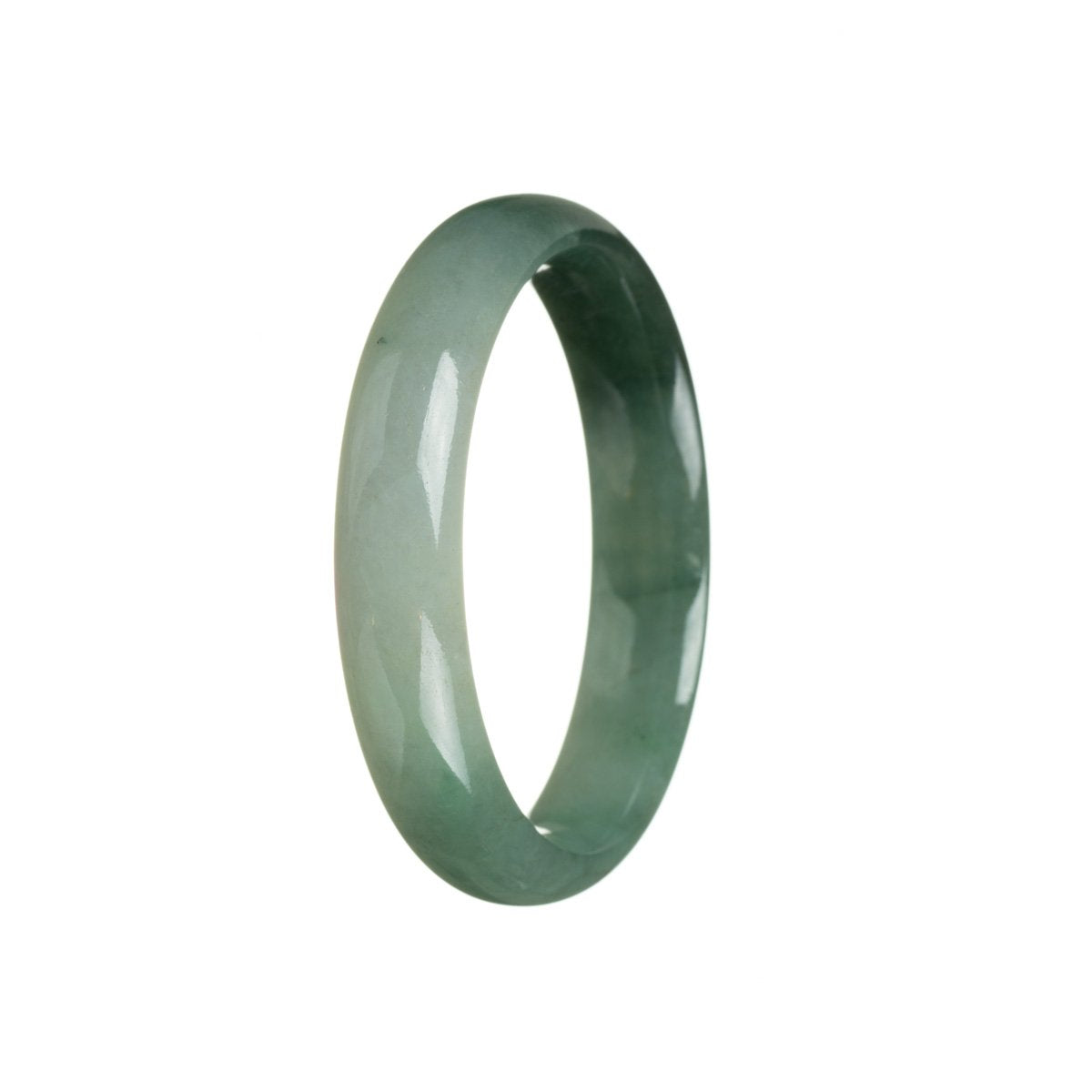 Close-up of a half-moon shaped jade bangle with a rich green color, featuring intricate patterns.
