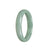 A beautiful green jade bangle bracelet with a half moon shape, made from genuine Grade A green jadeite jade.