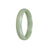 A light green traditional jade bangle with a half moon shape, measuring 55mm. This bangle is certified as untreated, ensuring its natural beauty. Created by MAYS™.