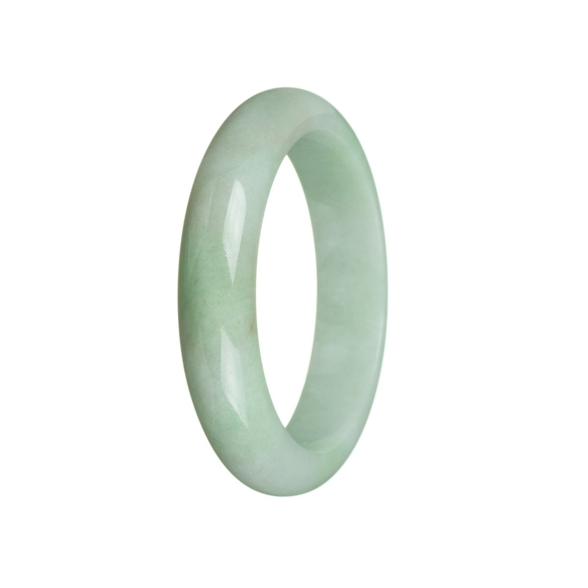 A half moon-shaped light green Burma Jade bracelet, untreated and made with real gemstones.