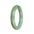 A round, Grade A green jadeite jade bangle with a diameter of 56mm, giving it an authentic and luxurious look.