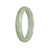 A light green jade bracelet with a 56mm half moon shape, made of authentic Grade A jadeite jade. This bracelet is from the brand MAYS™.