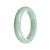 A light green traditional jade bangle bracelet with a half moon shape, measuring 57mm. Certified as untreated. A beautiful piece from MAYS GEMS.