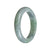 A lavender and green Burmese Jade bangle bracelet with a semi-round shape, measuring 55mm in diameter.