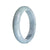 A beautiful bluish lavender Burma jade bangle bracelet with a half moon shape, crafted from genuine, natural jade.