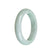 A genuine Type A Burmese Jade bangle featuring a semi-round shape and a greyish white color.