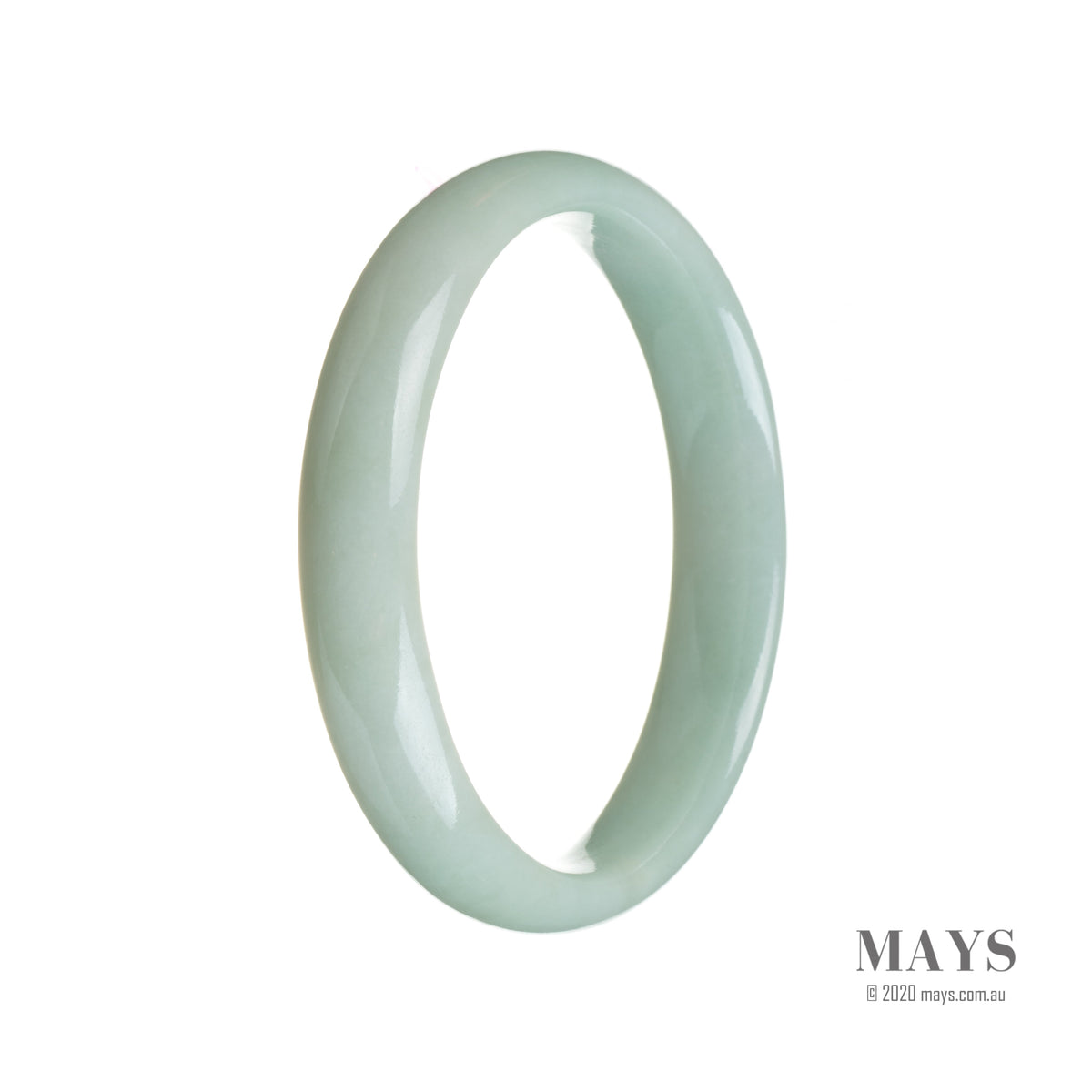 A close-up photo of a pale green Burmese jade bangle bracelet with a half moon shape, measuring 59mm in diameter. The bracelet has a smooth, polished surface and a high-quality grade A jade. It is a stunning piece of jewelry from the MAYS collection.