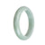 A beautiful pale green Burma Jade bangle with a semi-round shape, measuring 58mm in size. Certified as Type A Jade.