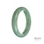 A beautiful green jadeite jade bangle with a semi-round shape, measuring 59mm. Perfect for adding an elegant touch to any outfit.