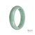 Close-up image of an exquisite green Burmese jade bangle bracelet, showcasing its smooth semi-round shape and captivating Grade A authenticity.