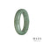A close-up image of a green Burmese jade bangle bracelet with a half-moon shape, measuring 53mm in diameter. The bracelet has a genuine Grade A quality and is made by MAYS™.