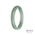 A beautiful jade bangle with a half moon shape, made from authentic Grade A Green with White Burma Jade.