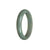 A beautiful half moon-shaped bracelet made of authentic Grade A Green with Grey Burmese Jade, measuring 56mm.