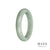 An elegant green jade bracelet with a 58mm half moon design, crafted with authentic, natural jade.