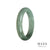 A beautiful half moon shaped jadeite bangle with a genuine untreated bluish green and deep green color. It measures 58mm in size.