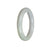 A round lavender and pale green jade bangle bracelet, perfect for adding a touch of elegance to any outfit.
