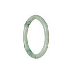 A beautiful round jade bracelet with a flower pattern, certified as Grade A quality. The bracelet measures 55mm in diameter. Sold by MAYS GEMS.