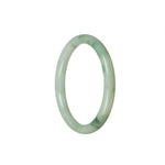 A close-up view of a round jade bangle bracelet with a beautiful natural flower pattern. The bracelet has a diameter of 55mm and is made with authentic jade.