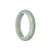 A lavender jadeite bangle with a smooth half-moon shape, made from high-quality Grade A jade.