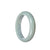 A lavender jadeite bangle featuring a half-moon design, untreated and crafted with real jadeite.